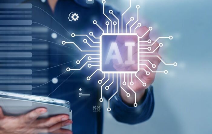 Ejecutivo usando una tablet frente a una interfaz digital que representa la adopción de agentes de IA en empresas locales.